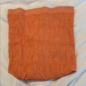 Orange strapless body suit